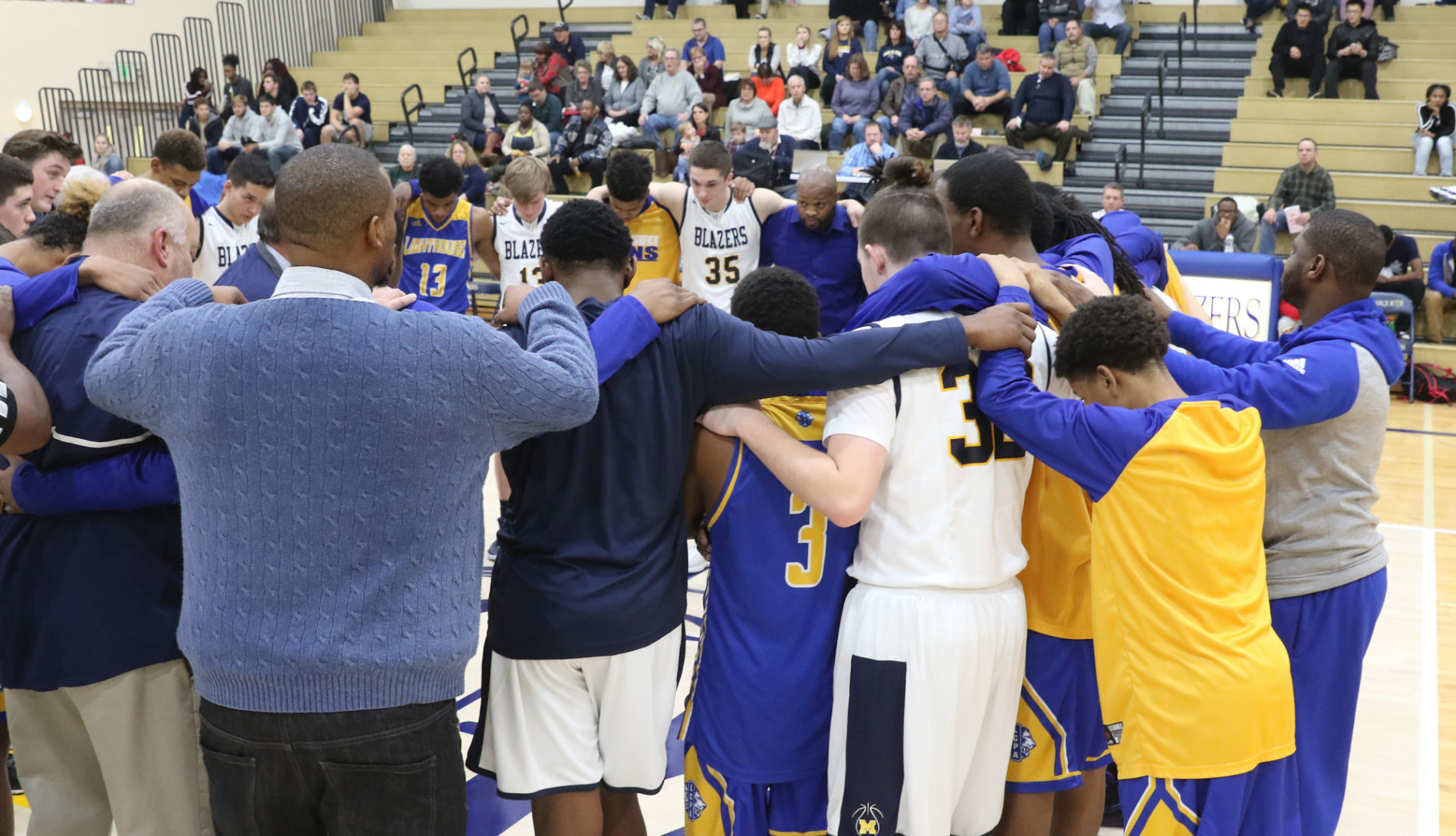 Lighthouse at Marquette Catholic boys basketball